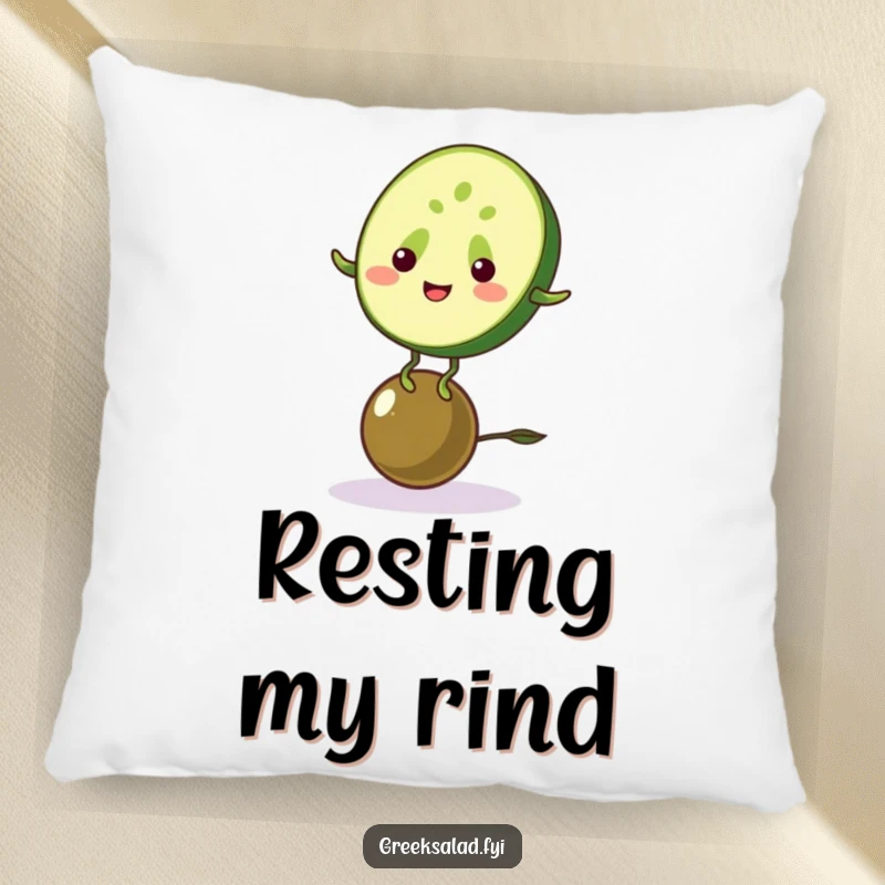 Funny pillow featuring a cheerful cucumber balancing on an olive, providing cozy humor and healthy food charm.