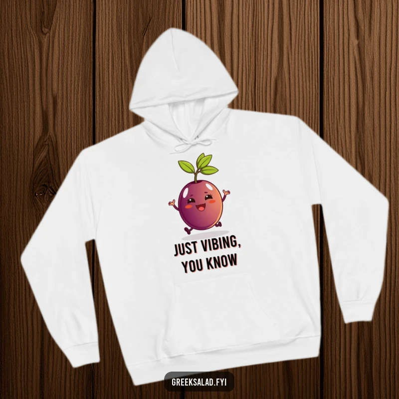 Funny Kalamata olive on a hoodie, joyfully hopping with its stem, a comfortable and humorous apparel choice.