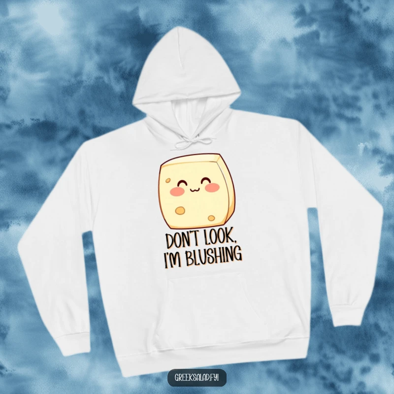 Funny hoodie with an illustration of a shy feta cheese block blushing sweetly, offering warmth and a touch of endearing dairy cuteness.